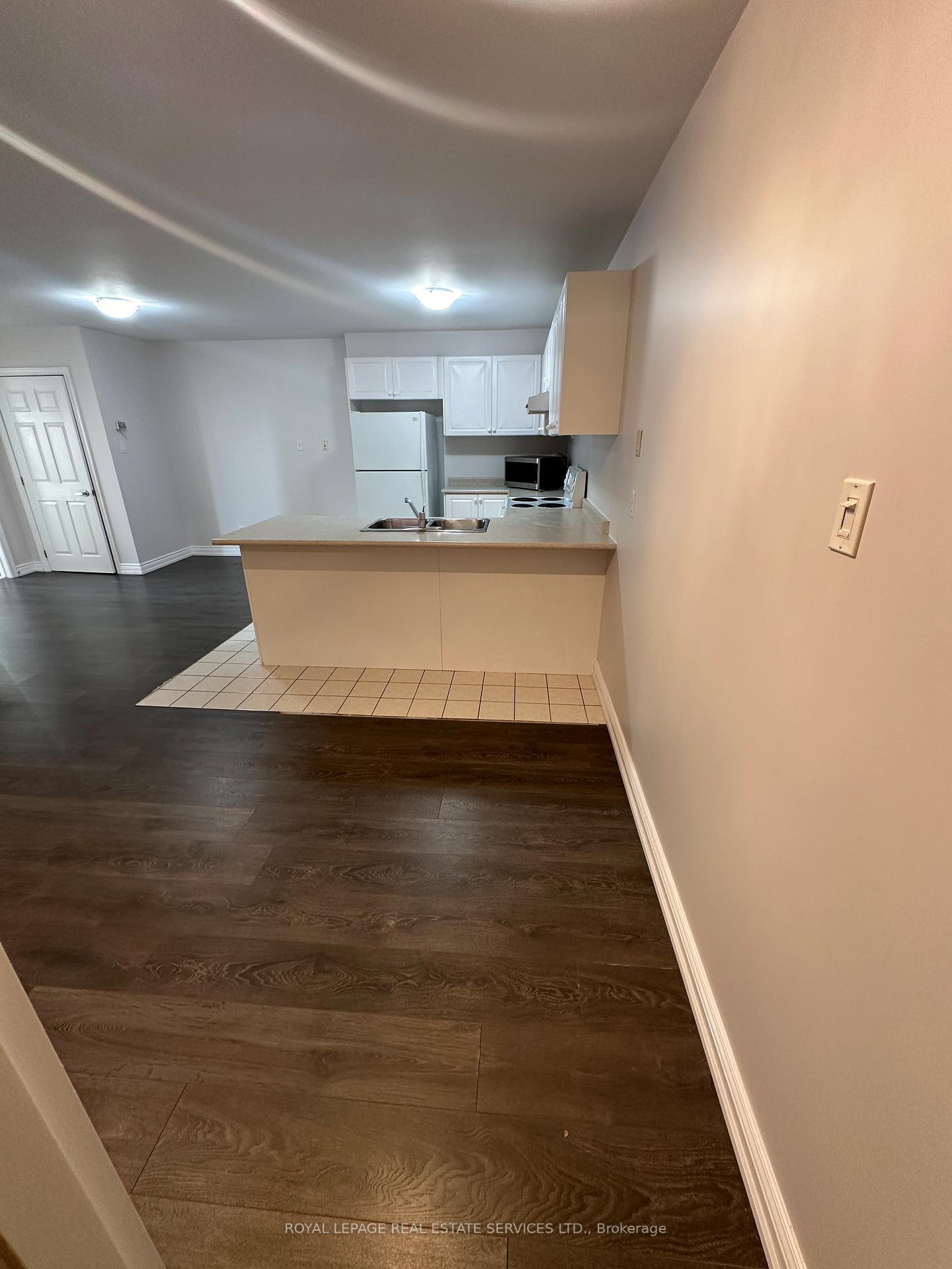 Photo 3 of Unit 203, 10055 Keele Street, Vaughan, Maple — HOMEH