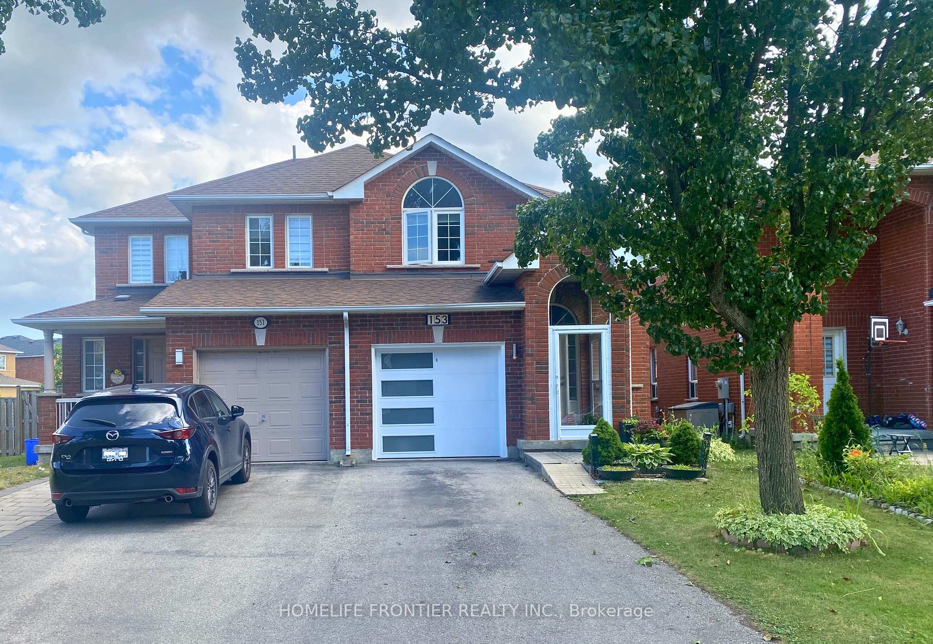 Front of 153 Purcell Crescent