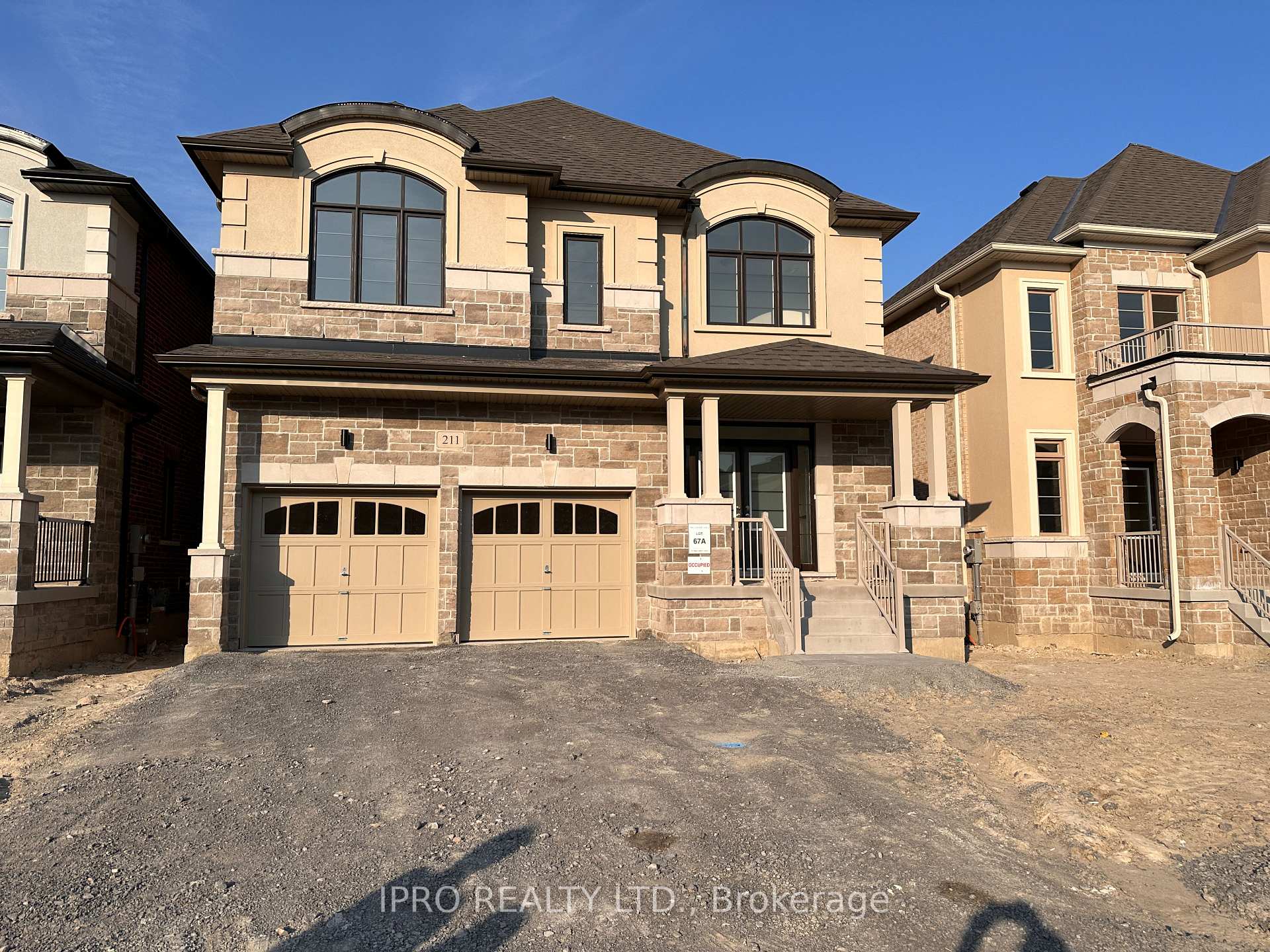Front of 211 Ronald Guscott Street