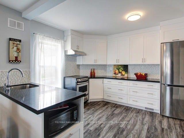 Photo 4 of Unit Main, 21 Maple Street, Oshawa, Central — HOMEH