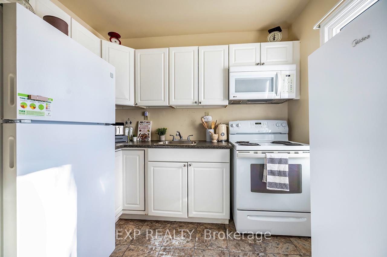 Photo 17 of 124 Park Road S, Oshawa, Vanier — HOMEH