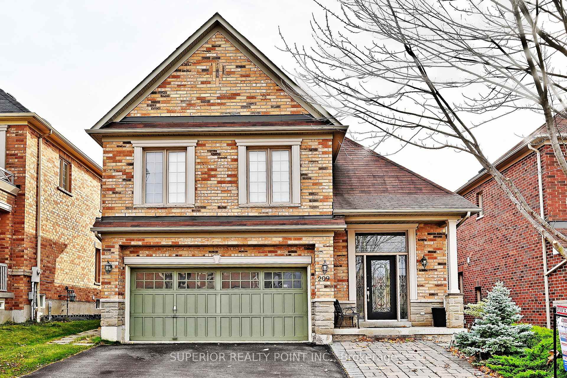 Front of 209 Queen Filomena Avenue