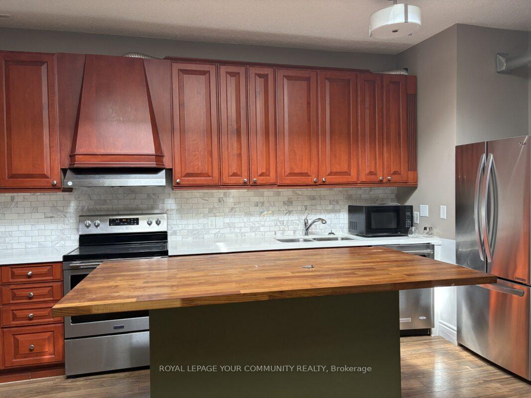Photo 6 of Unit A, 15231 Yonge Street, Aurora, Aurora Village — HOMEH