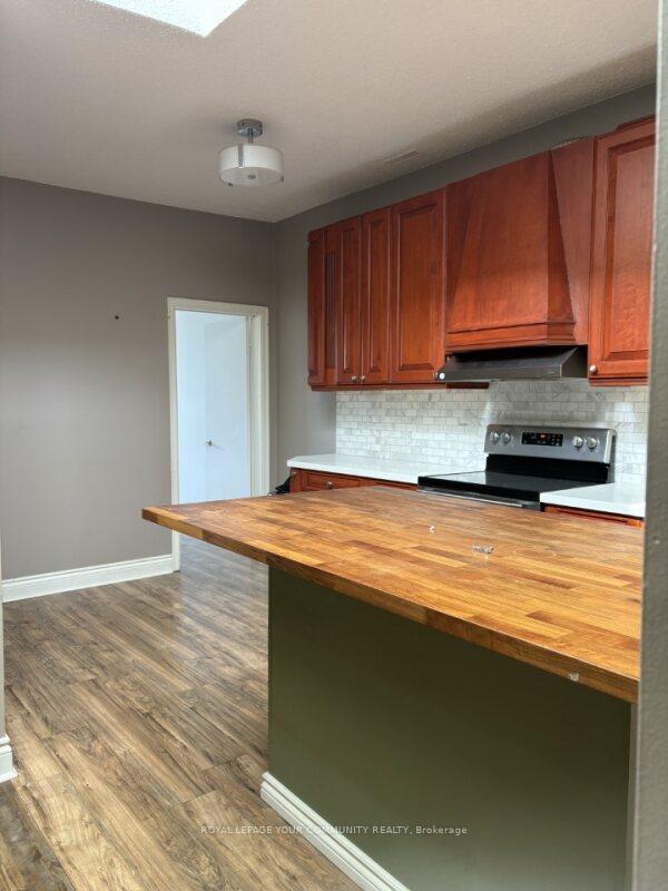 Photo 5 of Unit A, 15231 Yonge Street, Aurora, Aurora Village — HOMEH