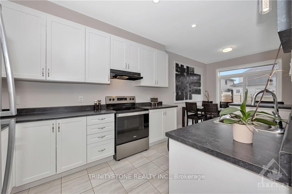 Photo 9 of 801 Brittanic Road, Ottawa, Kanata - Emerald Meadows/Trailwest — HOMEH