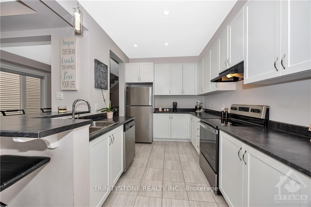 Photo 11 of 801 Brittanic Road, Ottawa, Kanata - Emerald Meadows/Trailwest — HOMEH