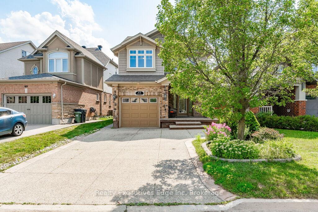 Photo 2 of 67 Revell Drive, Guelph, Clairfields/Hanlon Business Park — HOMEH