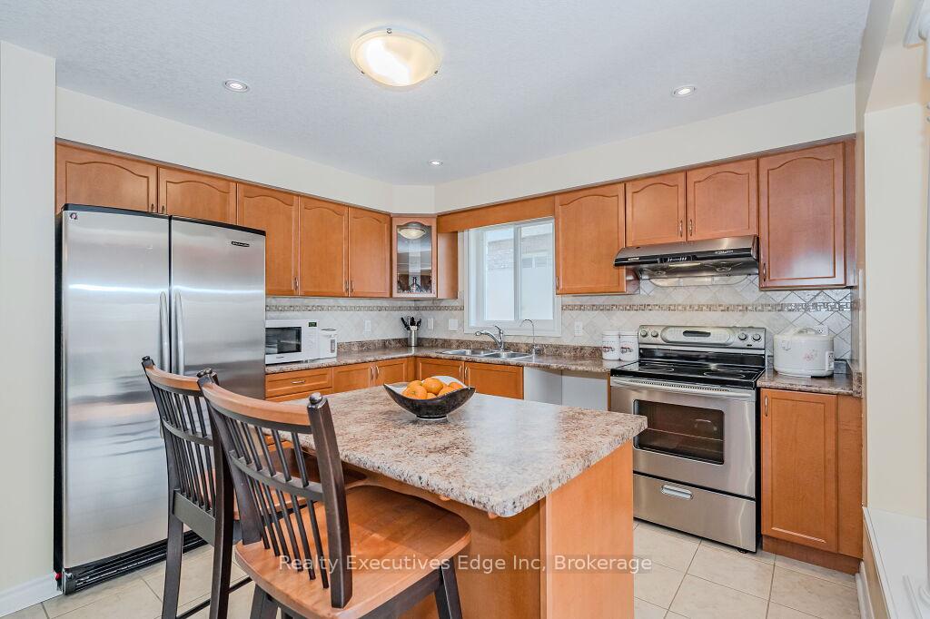 Photo 20 of 67 Revell Drive, Guelph, Clairfields/Hanlon Business Park — HOMEH