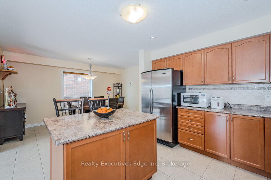 Photo 25 of 67 Revell Drive, Guelph, Clairfields/Hanlon Business Park — HOMEH