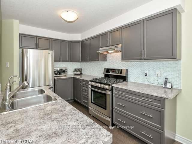 Photo 3 of 41 Revell Drive, Guelph, Clairfields/Hanlon Business Park — HOMEH