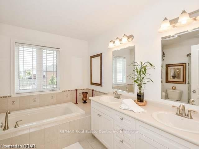 Photo 7 of 41 Revell Drive, Guelph, Clairfields/Hanlon Business Park — HOMEH