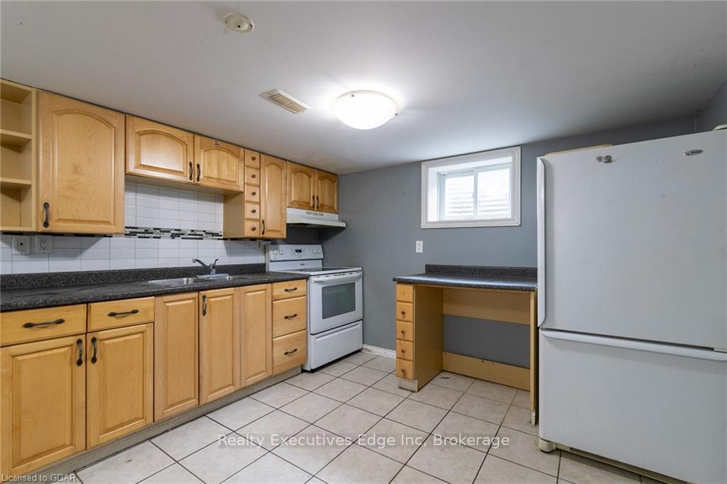 Photo 2 of Unit (Basement), 162 Victoria Road, Guelph, St. George's — HOMEH