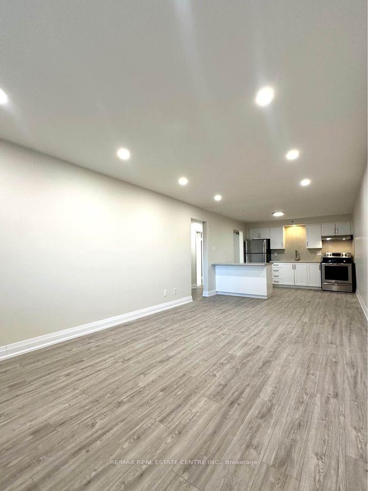 Photo 3 of Unit 4, 2 Normandy Drive, Guelph, St. George's — HOMEH