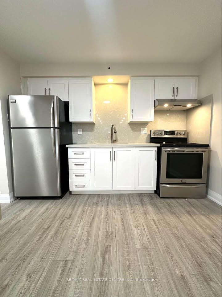 Photo 4 of Unit 4, 2 Normandy Drive, Guelph, St. George's — HOMEH