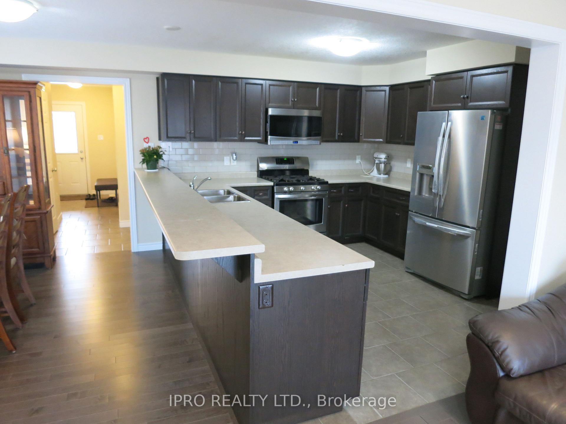 Photo 1 of 77 Oakes Crescent, Guelph, Grange Road — HOMEH