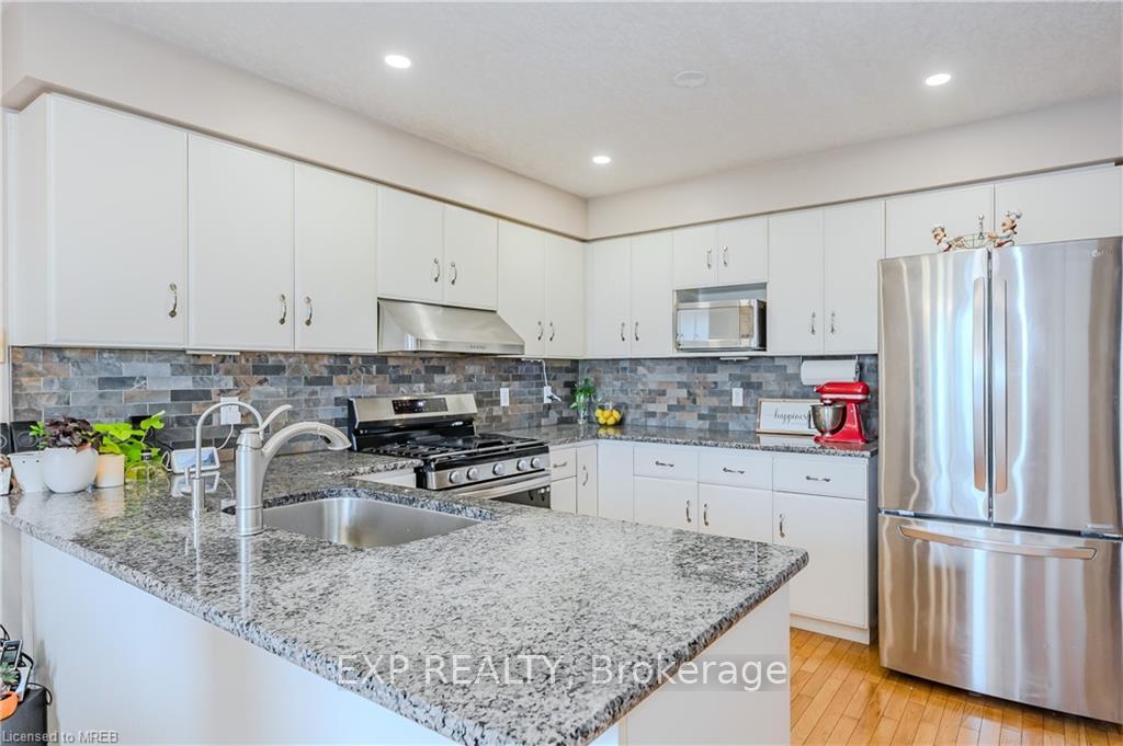 Photo 2 of 119 Silurian Drive, Guelph, Grange Road — HOMEH