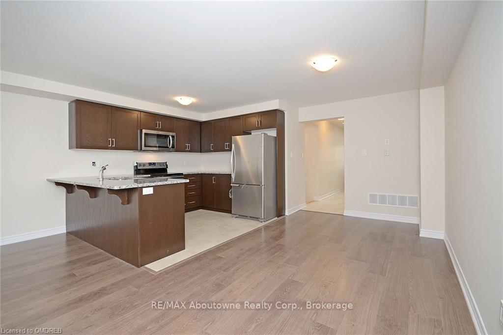 Photo 7 of 30 Skinner Drive, Guelph, Grange Road — HOMEH