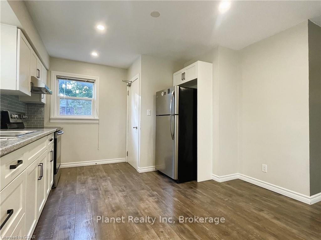 Photo 2 of Unit 1, 1 Western Avenue, Guelph, Junction/Onward Willow — HOMEH