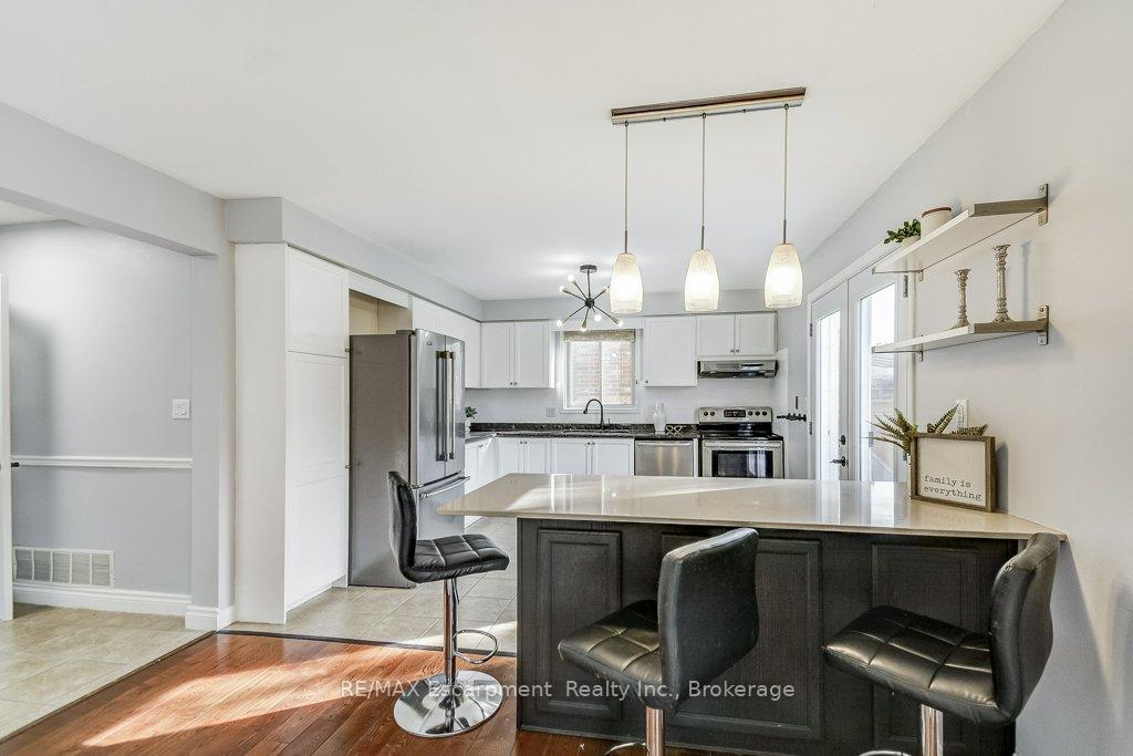 Photo 12 of 19 National Drive, Hamilton, Gershome — HOMEH