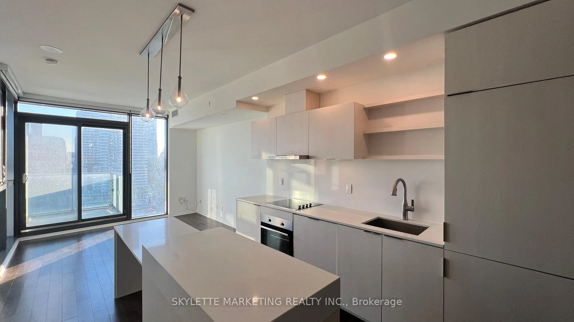 Photo 3 of Unit 1401, 16 Bonnycastle Street, Toronto, Waterfront Communities — HOMEH