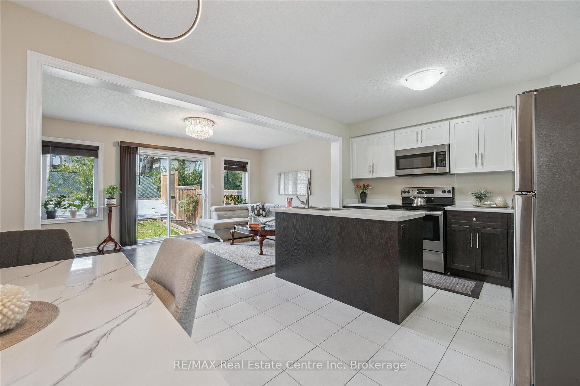 Photo 3 of 23 Ambrous Crescent, Guelph, Kortright East — HOMEH