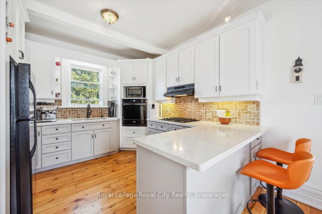 Photo 17 of 572 Woolwich Street, Guelph, Exhibition Park — HOMEH