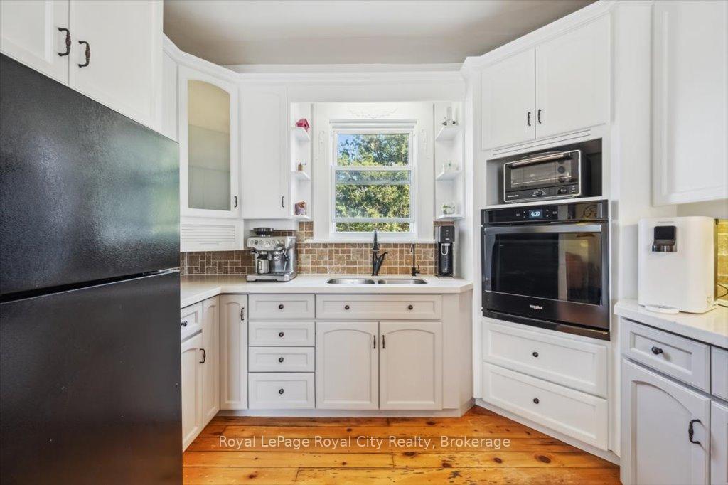 Photo 21 of 572 Woolwich Street, Guelph, Exhibition Park — HOMEH