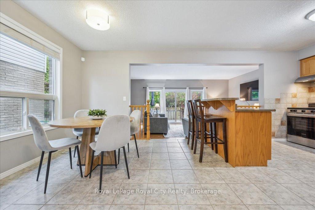 Photo 10 of 93 Doyle Drive, Guelph, Clairfields/Hanlon Business Park — HOMEH