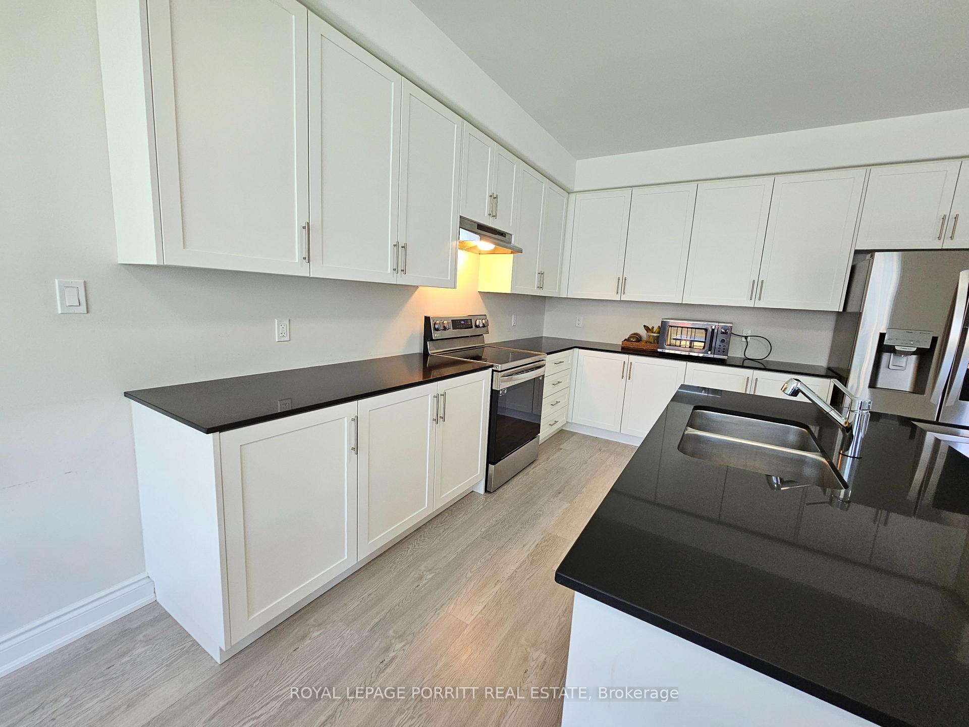 Photo 16 of 208 Mallory Terrace, Peterborough, Northcrest Ward 5 — HOMEH