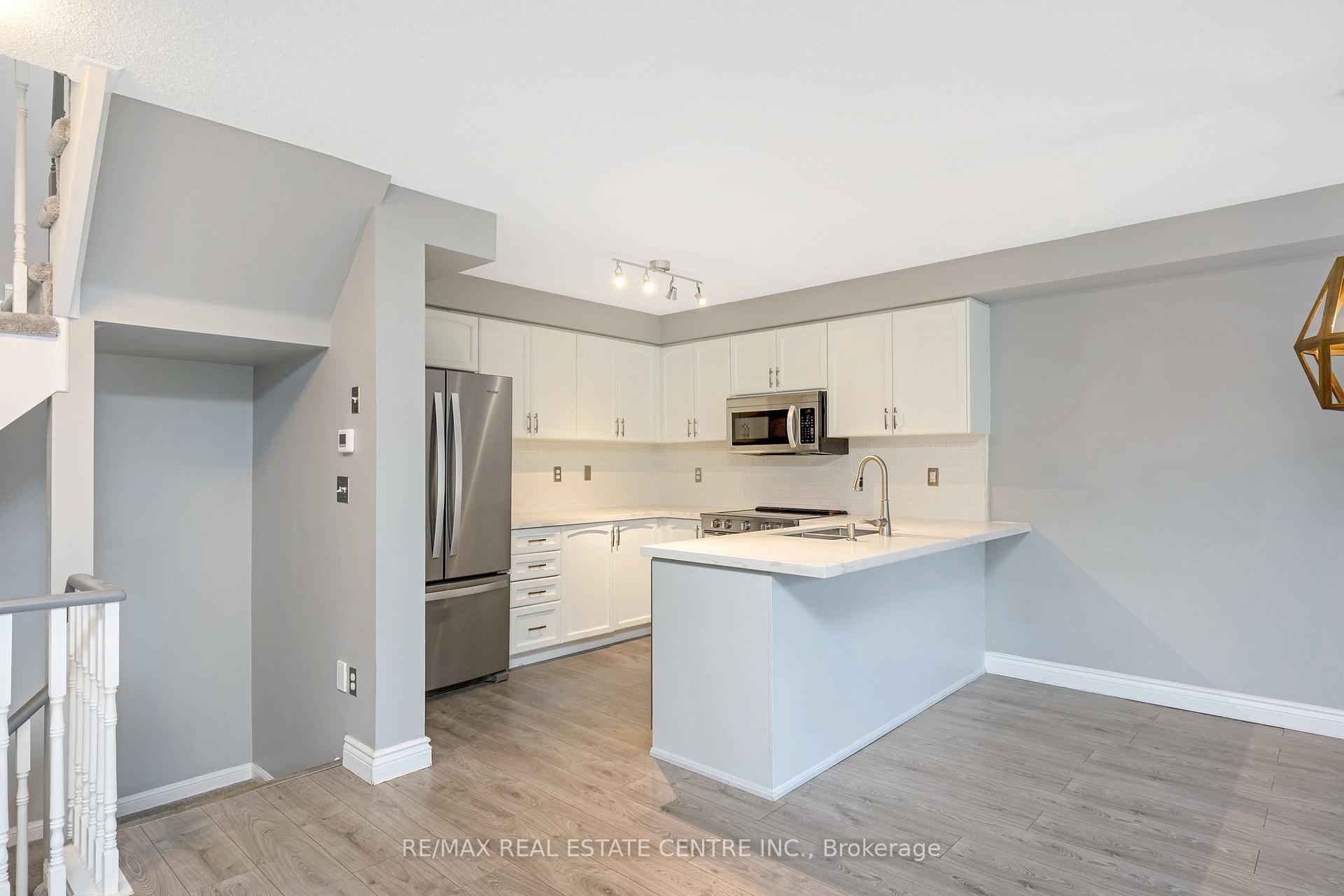 Photo 19 of Unit 100, 620 Ferguson Drive, Milton, Beaty — HOMEH