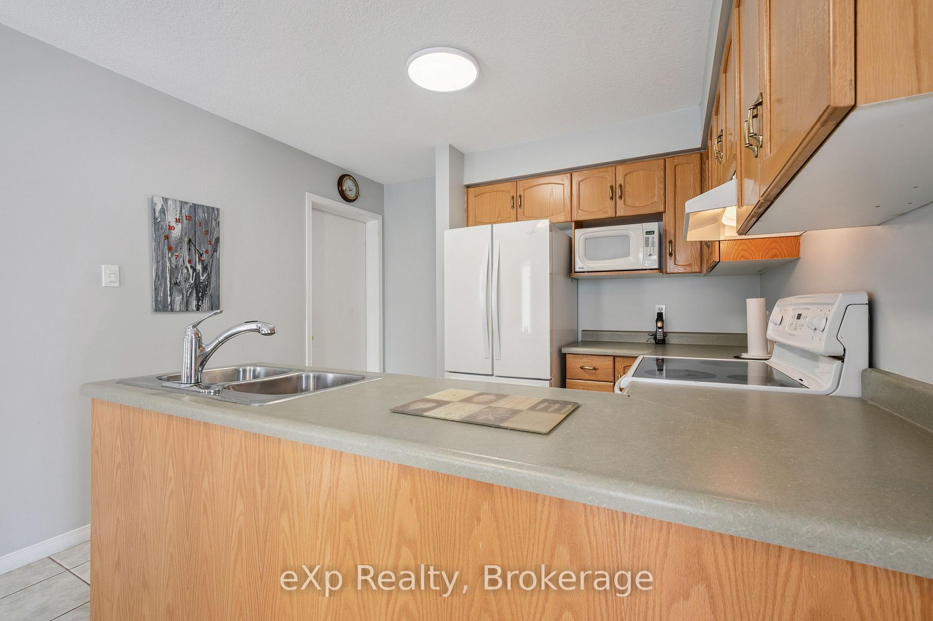 Photo 13 of 59 Swift Crescent, Guelph, Grange Road — HOMEH