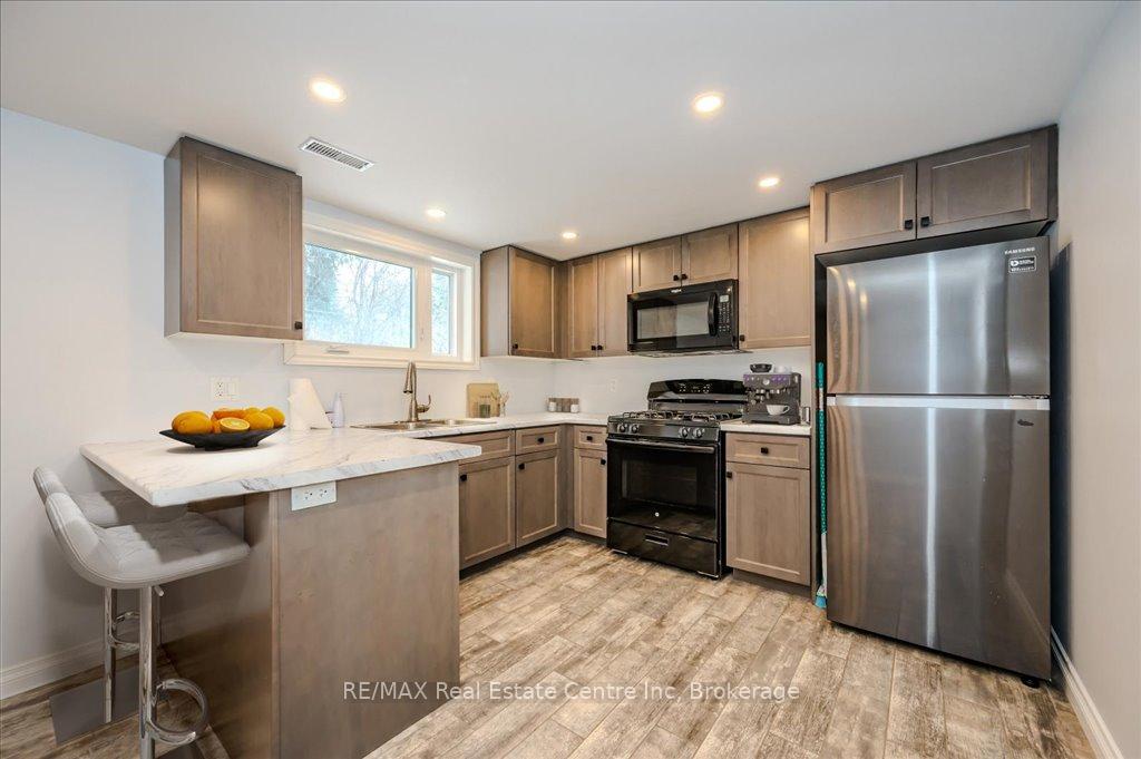 Photo 2 of 23 Julia Drive, Guelph, Junction/Onward Willow — HOMEH