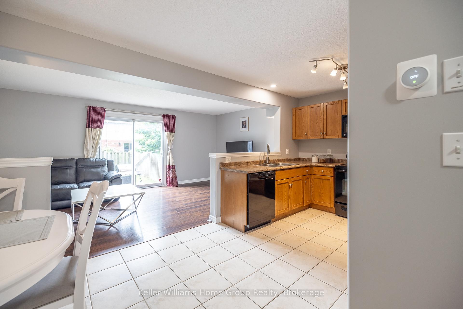 Photo 4 of 49 Washburn Drive, Guelph, Grange Road — HOMEH