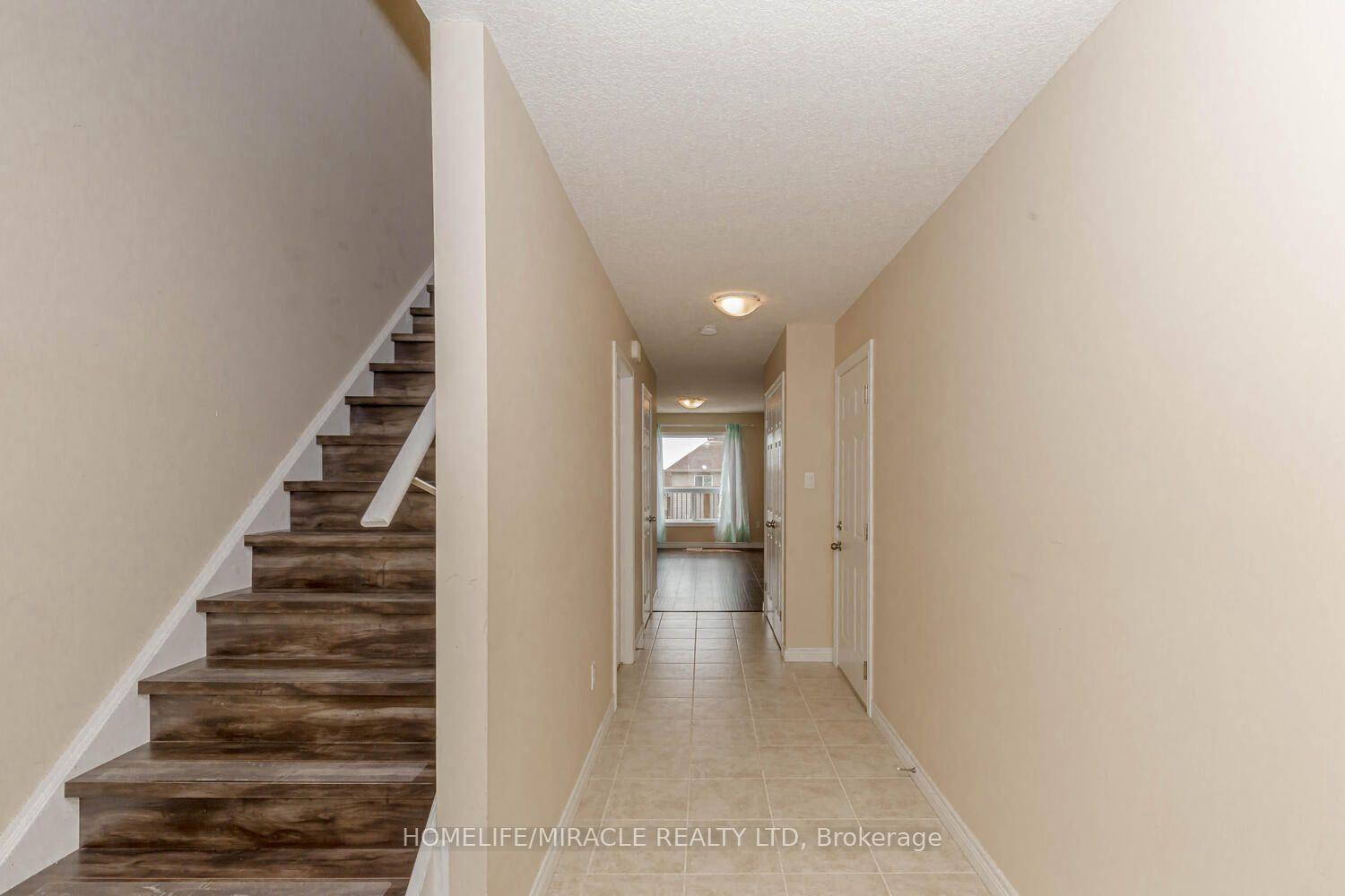 Photo 3 of 83 Oakes Crescent, Guelph, Grange Road — HOMEH