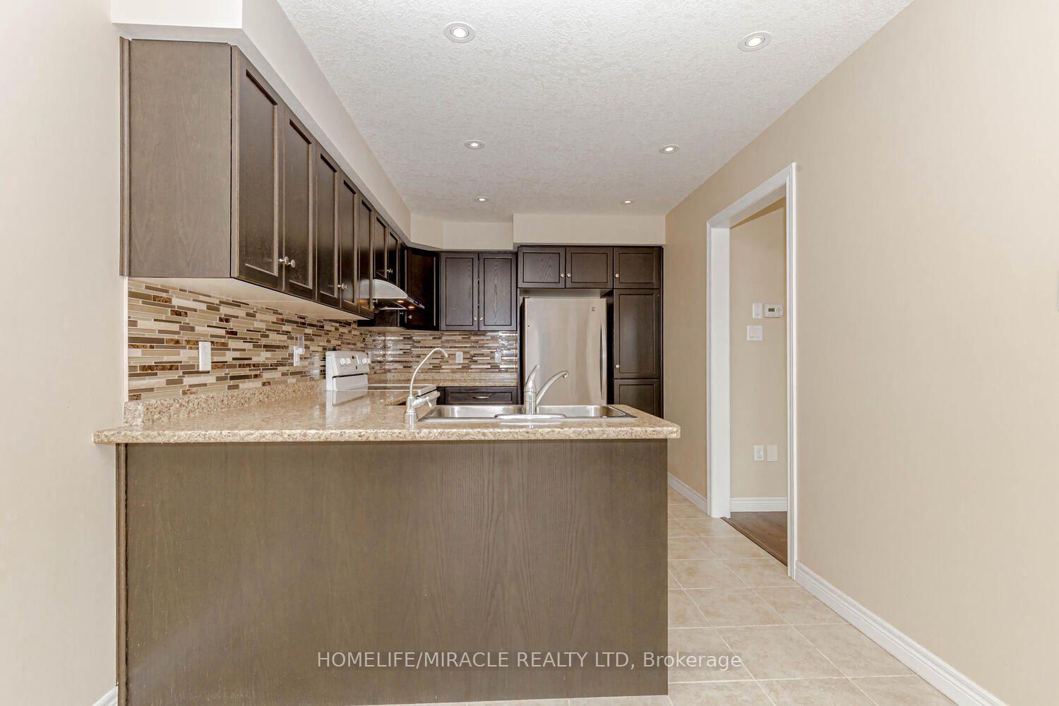 Photo 4 of 83 Oakes Crescent, Guelph, Grange Road — HOMEH