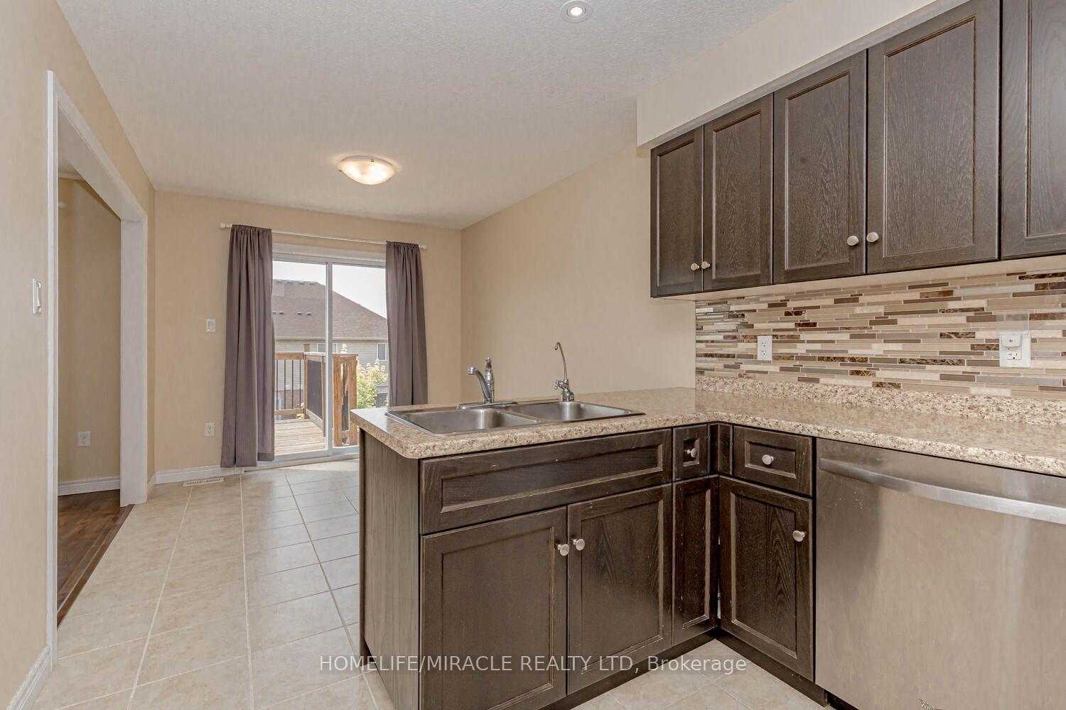 Photo 6 of 83 Oakes Crescent, Guelph, Grange Road — HOMEH