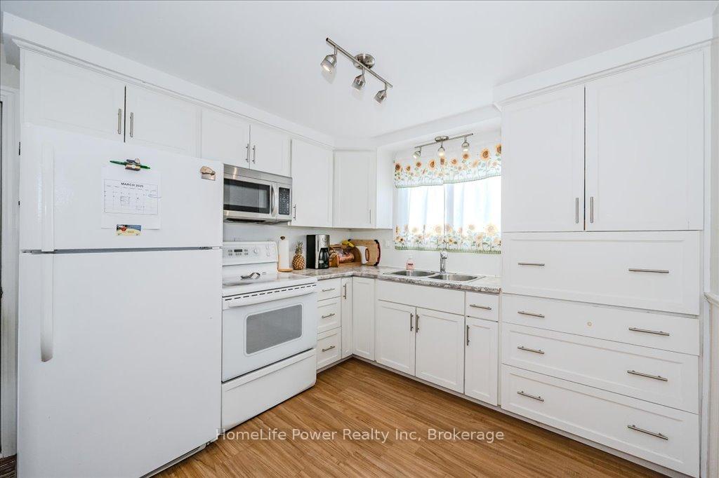 Photo 9 of 14 Upton Crescent, Guelph, Grange Road — HOMEH