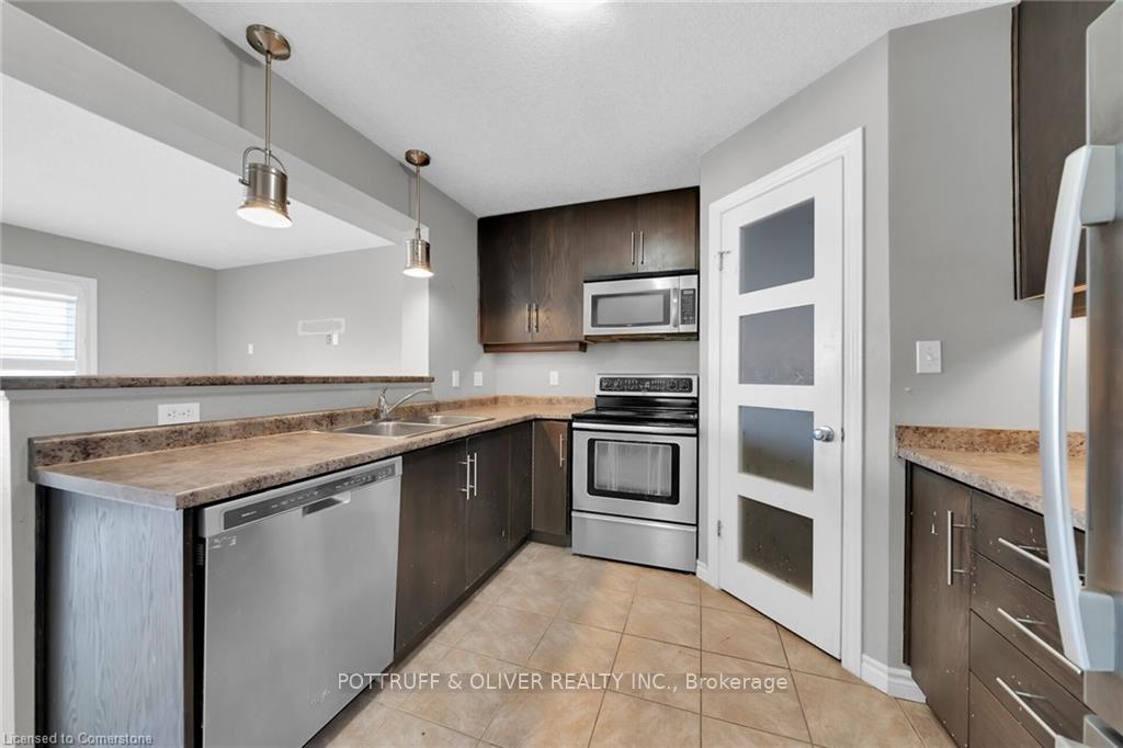 Photo 4 of 69 Curzon Crescent, Guelph, Willow West/Sugarbush/West Acres — HOMEH