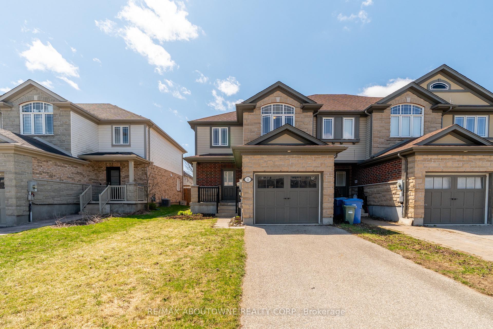 Photo 2 of 11 Revell Drive, Guelph, Clairfields/Hanlon Business Park — HOMEH