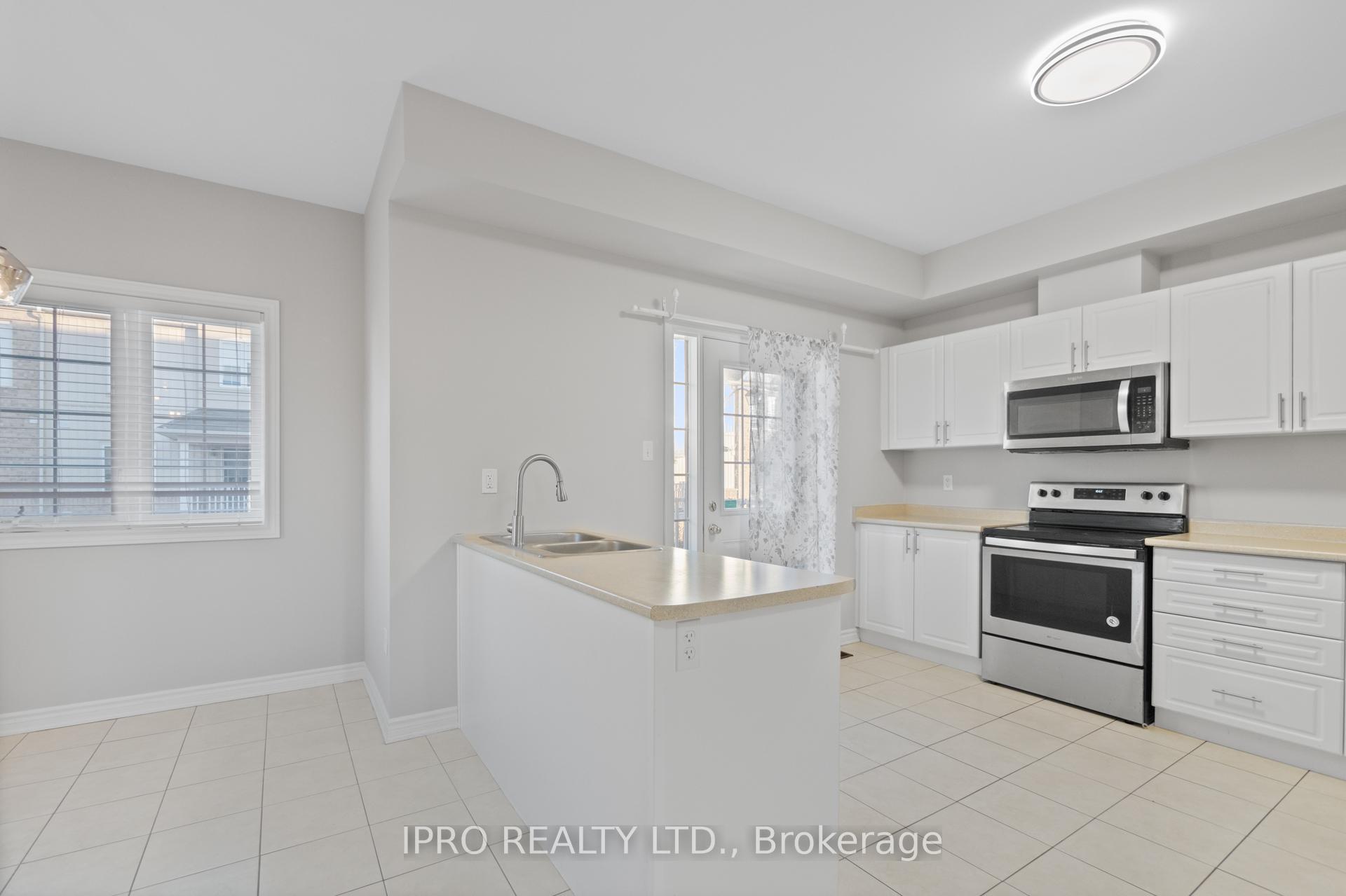 Photo 19 of Unit 1, 88 Decorso Drive, Guelph, Kortright East — HOMEH