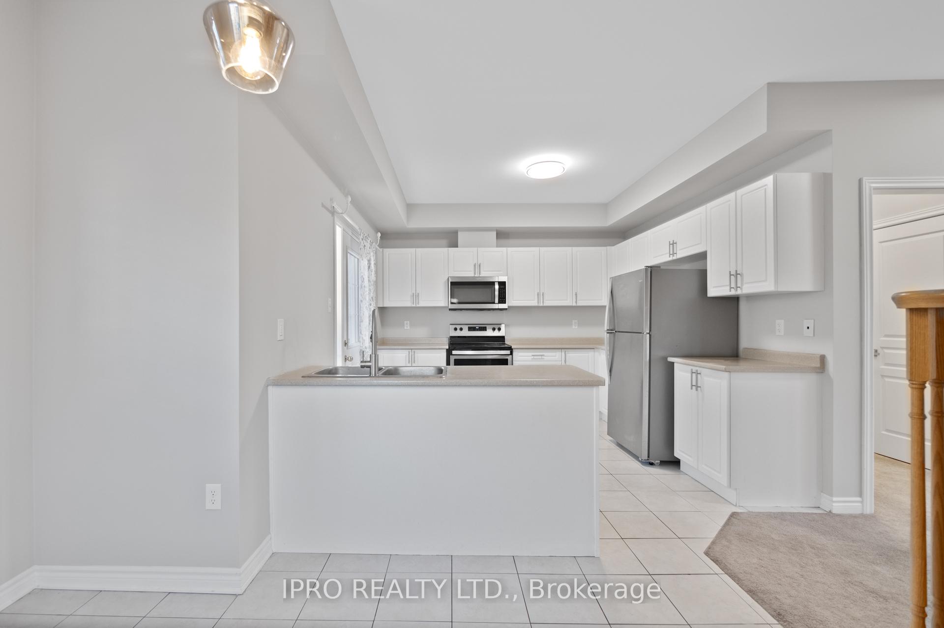 Photo 20 of Unit 1, 88 Decorso Drive, Guelph, Kortright East — HOMEH