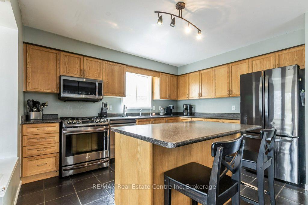Photo 11 of 71 Milson Crescent, Guelph, Kortright Hills — HOMEH