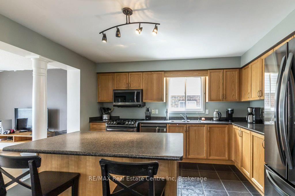 Photo 12 of 71 Milson Crescent, Guelph, Kortright Hills — HOMEH