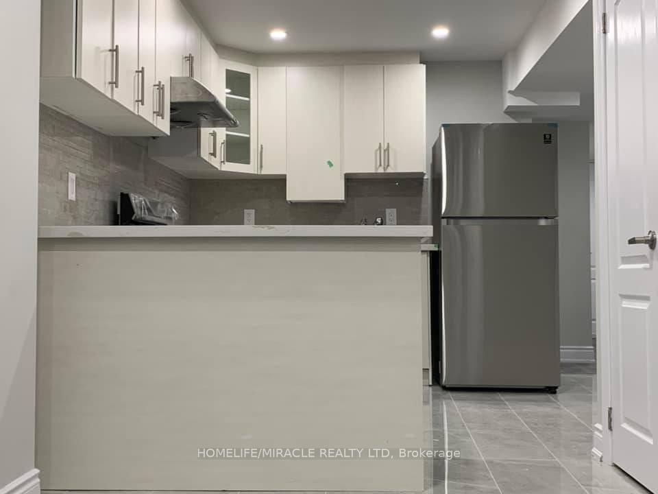 Photo 3 of Unit Basement, 65 Versailles Crescent, Brampton, Bram East — HOMEH