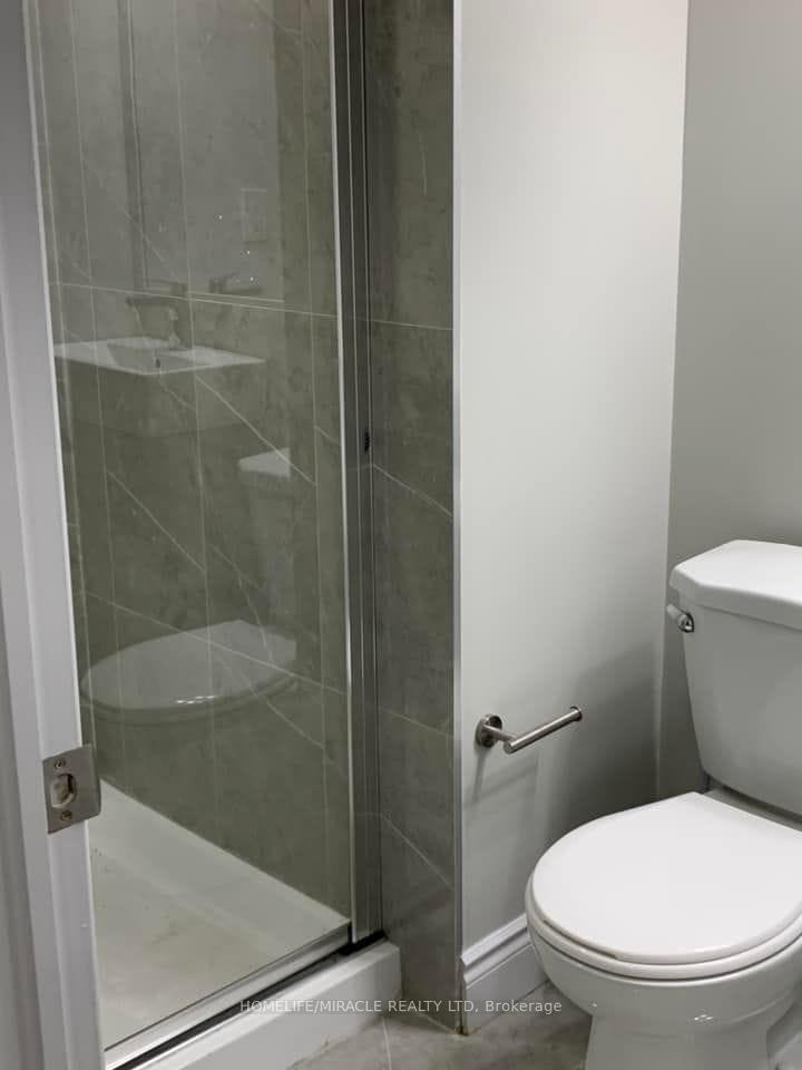 Photo 5 of Unit Basement, 65 Versailles Crescent, Brampton, Bram East — HOMEH
