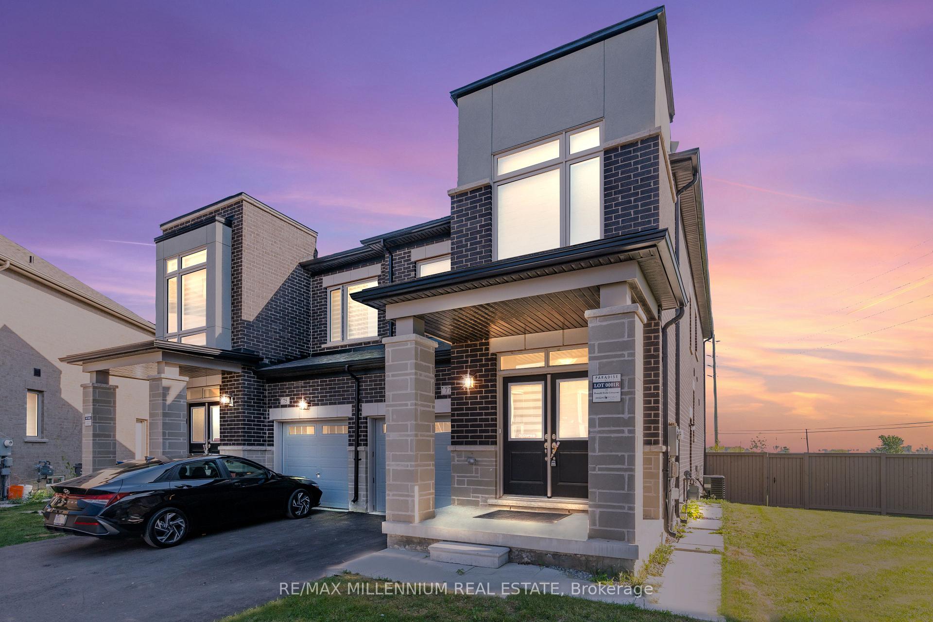 Front of 77 Donald Ficht Crescent N
