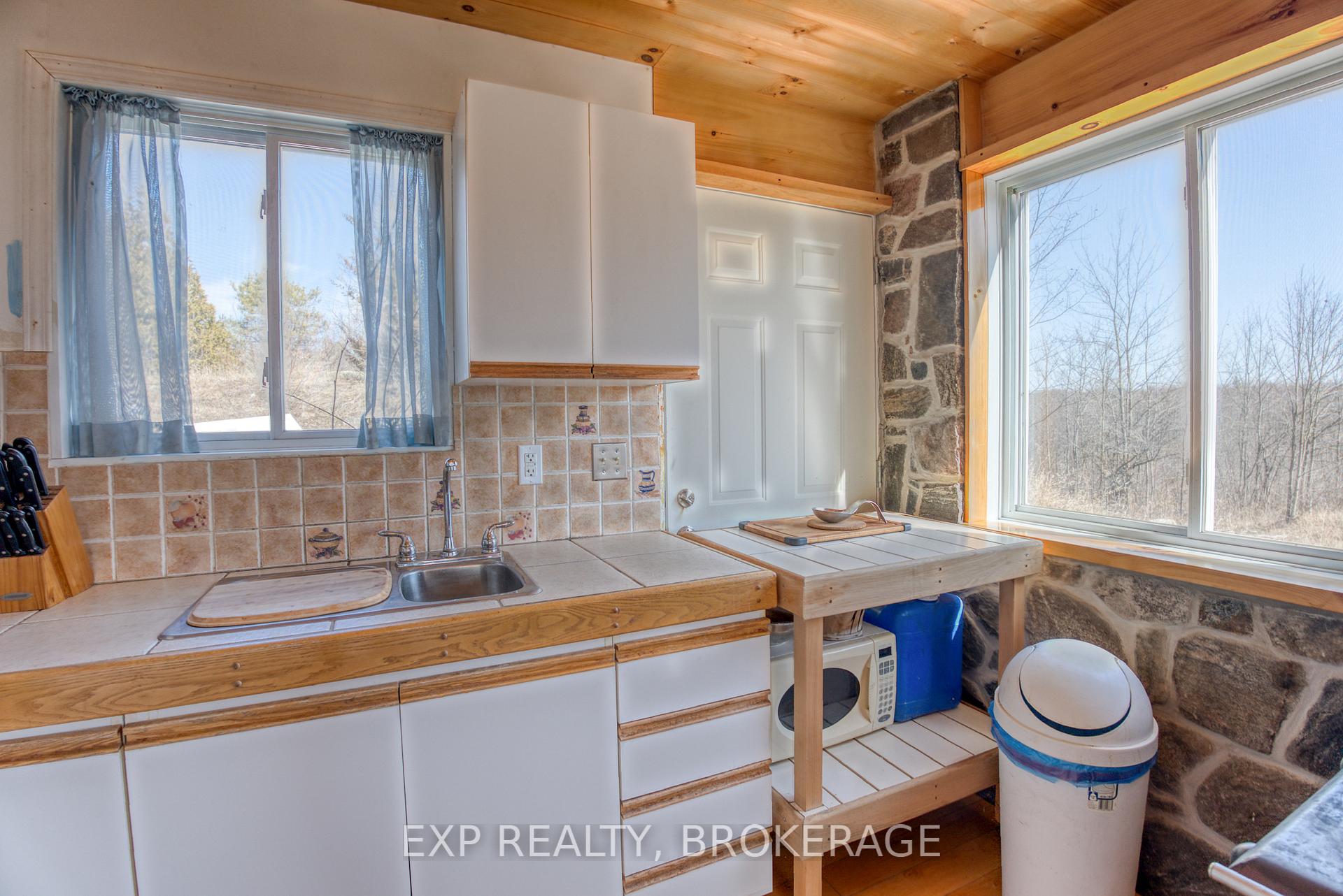 Photo 9 of 1114 McLean Road, Frontenac, Frontenac Centre — HOMEH