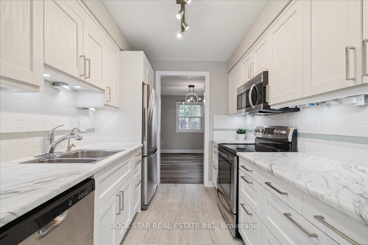 Photo 11 of 61 Adis Avenue, Hamilton, Gurnett — HOMEH