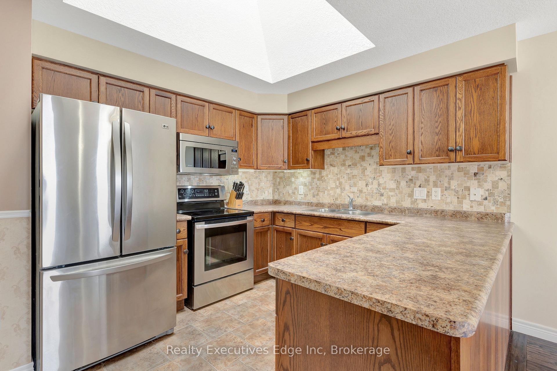Photo 4 of 16 Penfold Drive, Guelph, Grange Road — HOMEH