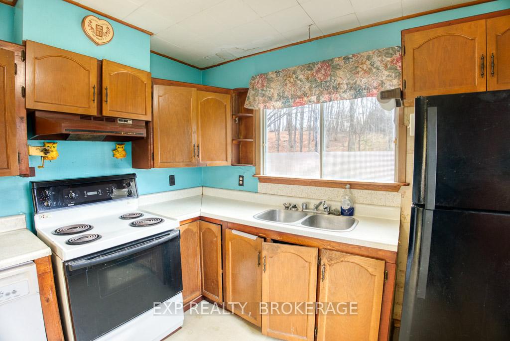 Photo 11 of 28114C Hwy 7, Frontenac, Frontenac Centre — HOMEH